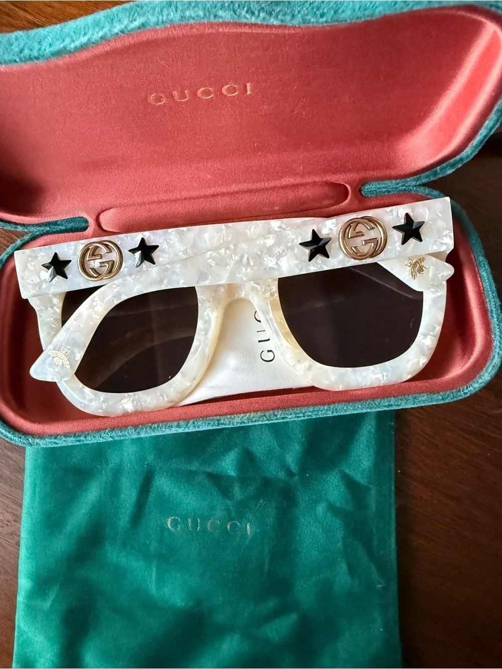 Gucci Ivory Marbled Oversized Sunglasses with Gold Logo and Black Star Accents